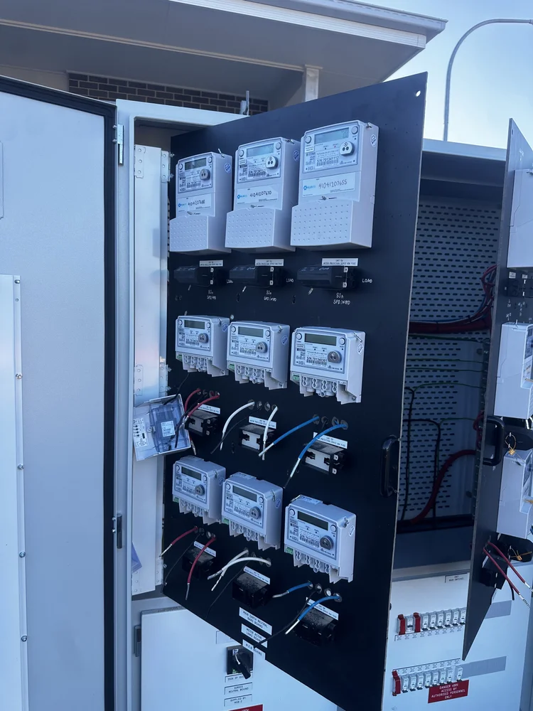 Meter panel with multiple digital meters and circuit breakers