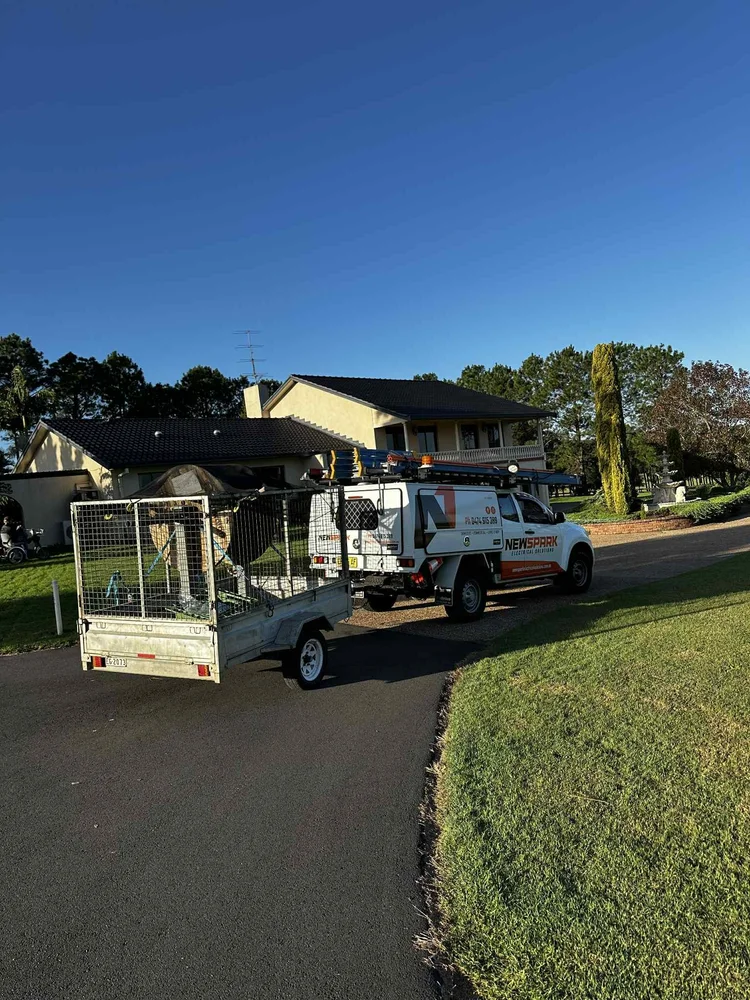 NewSpark branded truck parked at a job site